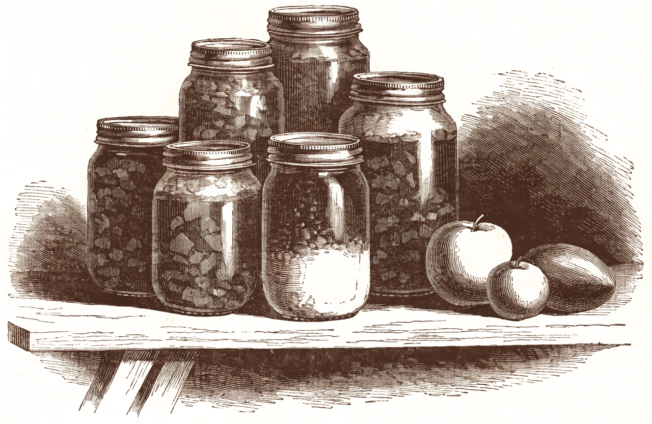 Home-canned jars cooling on a kitchen cloth