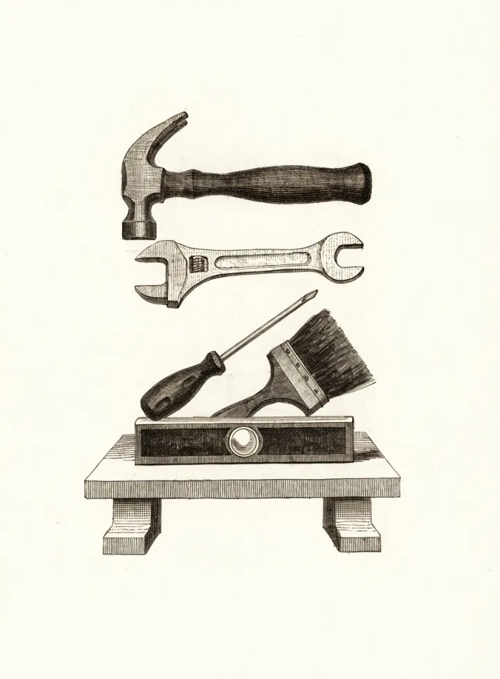 A hammer, wrench, screwdriver, brush and level on a bench, drawn as an engraving